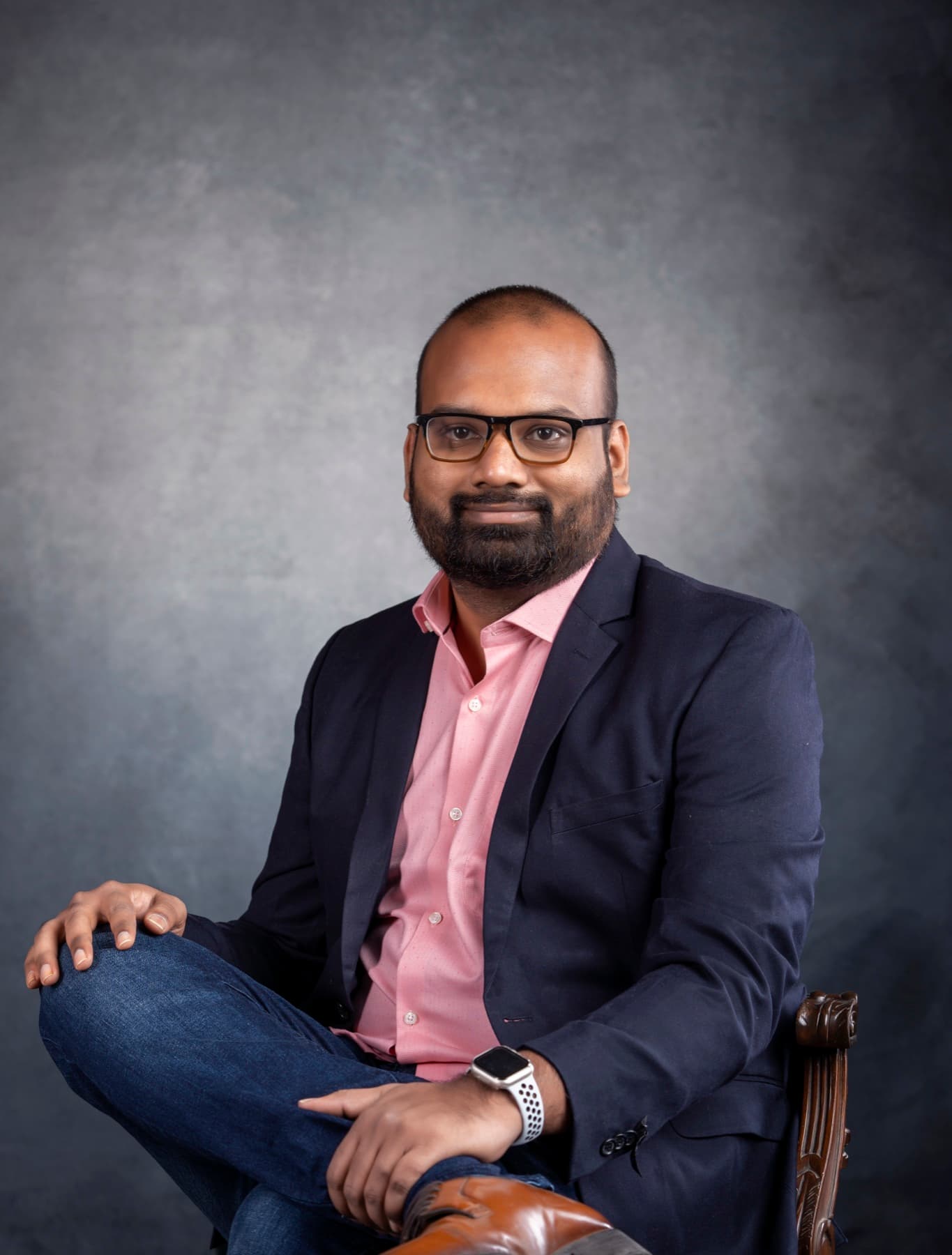 Sundar — founder of martech.llc, at the studio desk